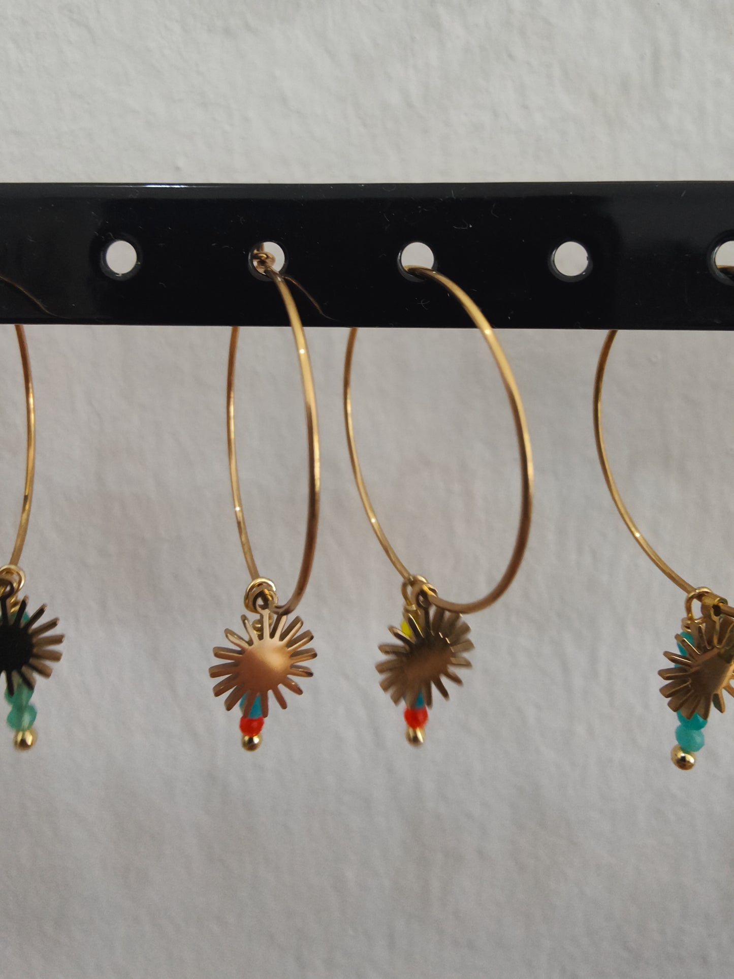Pendientes Sol